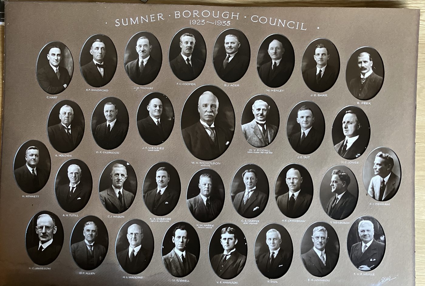 Photograph board of the Sumner Borough Council, 1923 to 1935, with oval portraits of every councillor